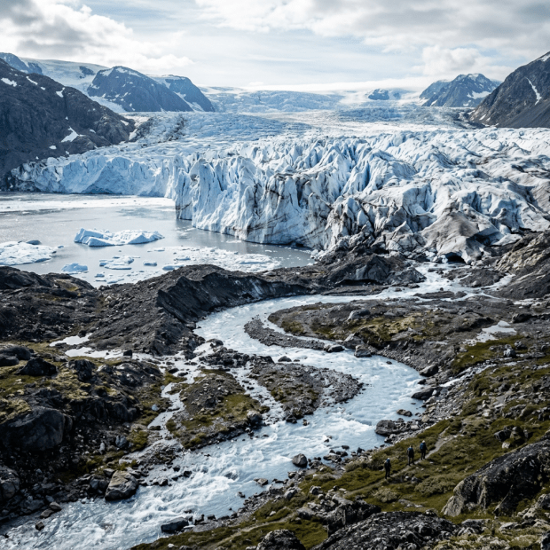 Greenland glaciers with meltwater stream